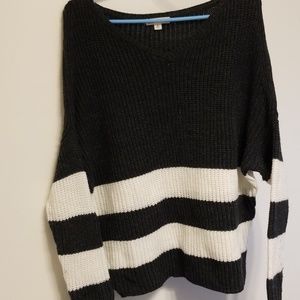 Knitted white and gray sweater